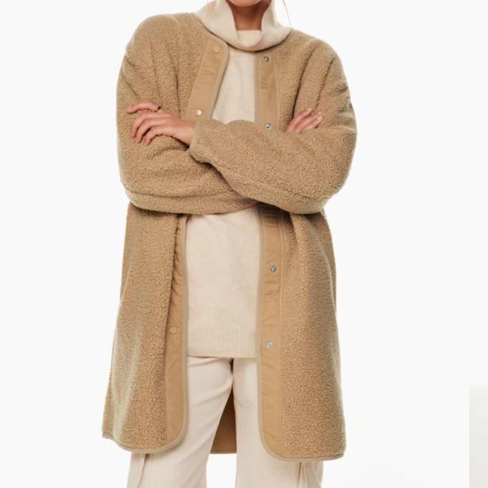 Beige & black Wilfred free Sherpa long liner jacket.